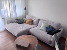 Ecksofa in grau/beige mit Cordstoff