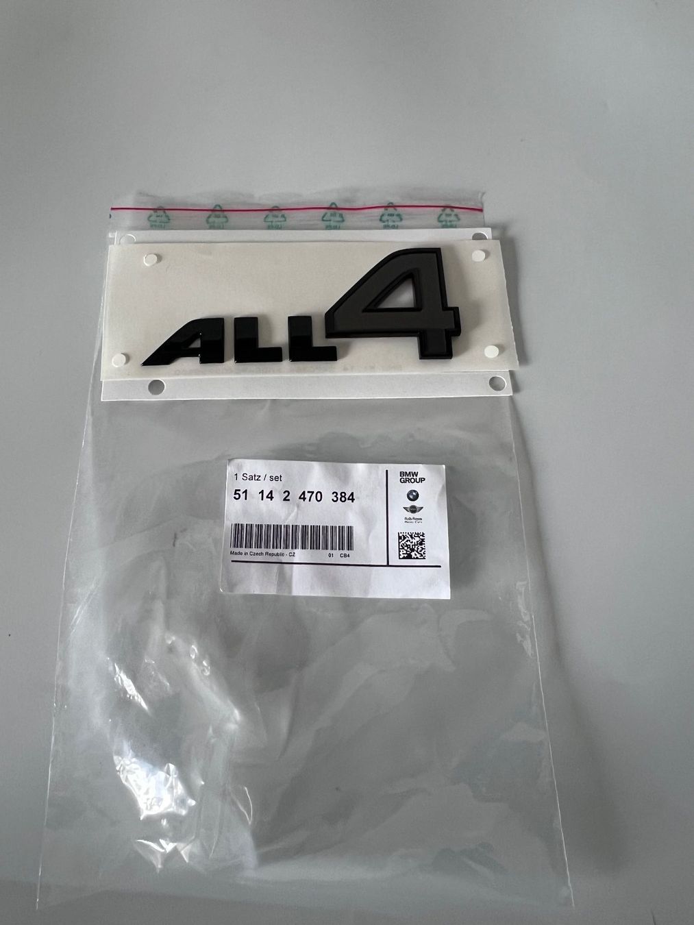 Mini Tutti pezzi di ricambio auto: Original Mini ALL4 Emblem 51142470384 – Nuovo e nell'imballaggio originale da Frauenfeld venduto da isa_9cy7 1