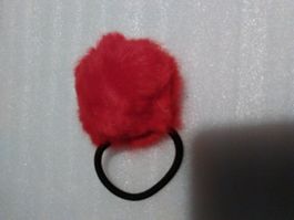 HAARGUMMI;ROT PELZ
