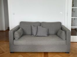 Canapé 2–3 places design gris – Excellent état – 90 x 175 cm