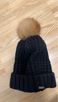 Warme Woolrich Wintermütze aus Wolle mit Fellbommel