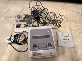 Super Nintendo Console with 2 Controllers and Games