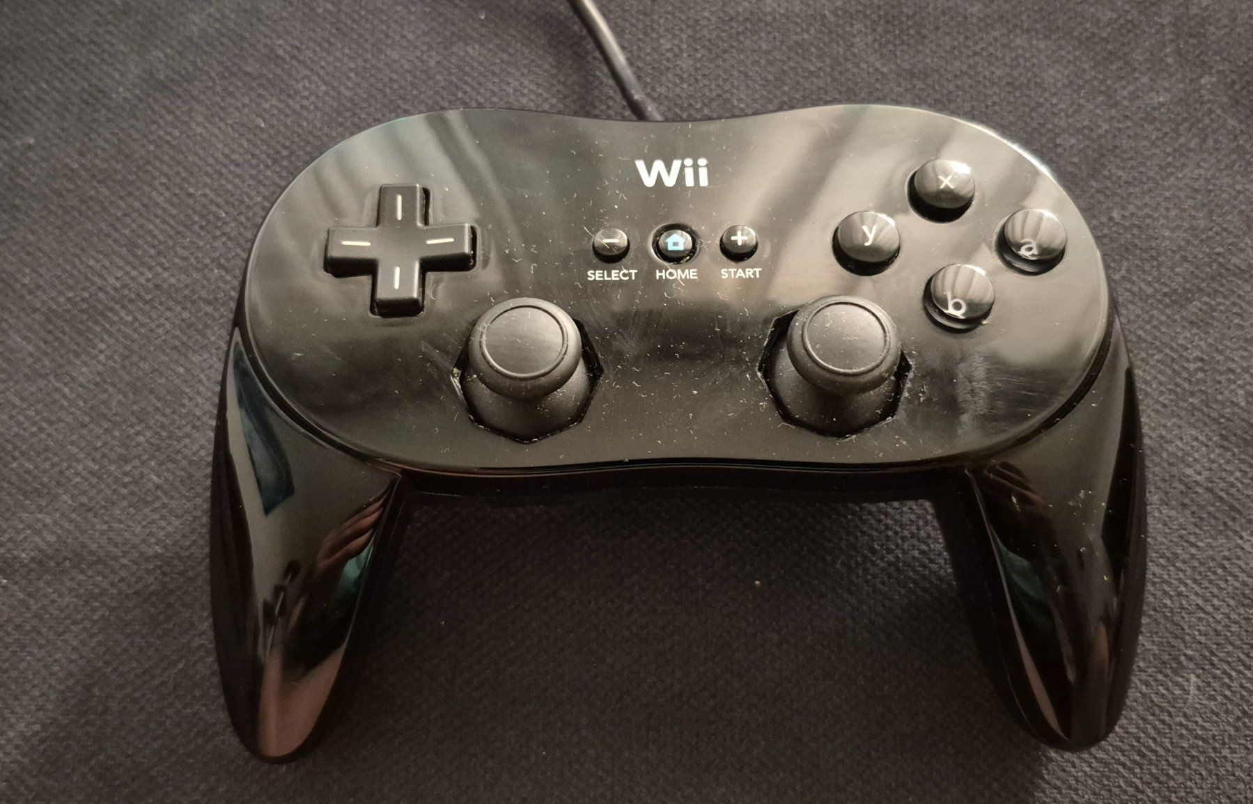Nintendo Controller: WII CONTROLLER MANETTE NINTENDO NOIRE JOYSTICK ADAPTATEUR – Usato da Grand-Lancy venduto da luc111