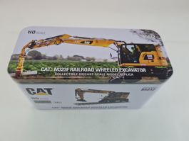 CAT 85612 M323F Schienenbagger H0 1:87