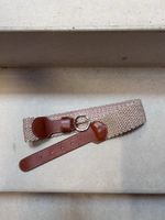 Gürtel von des petits hauts T1