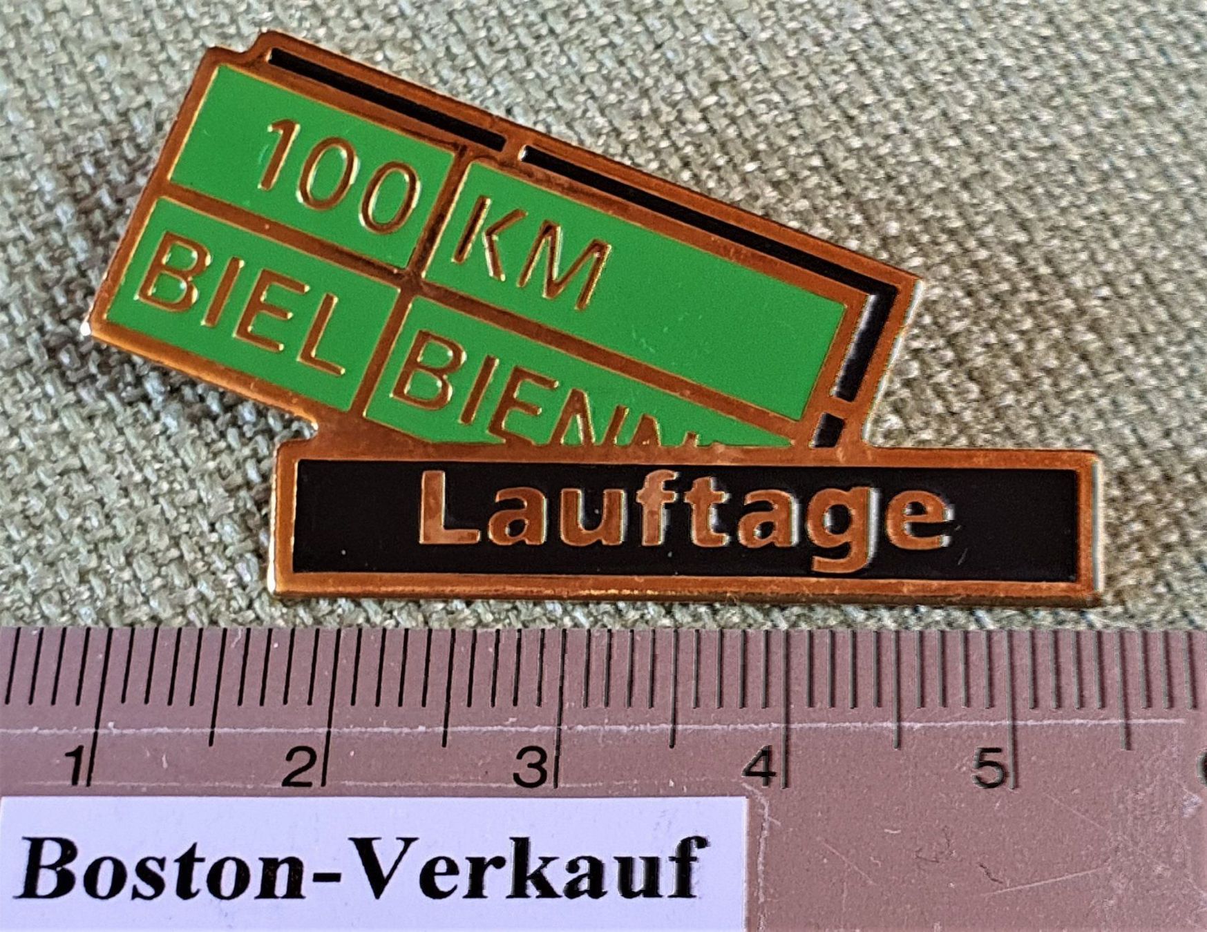 Medaglie: C198 - Pin 100 KM Biel Bienne Lauftage – Usato da Reinach BL venduto da Boston-Verkauf 1