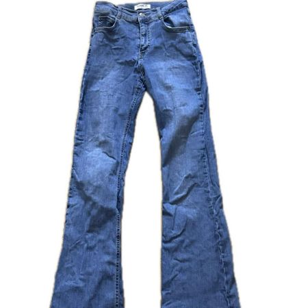 Jeans patte d'eph' bleu clair, taille haute - État neuf!