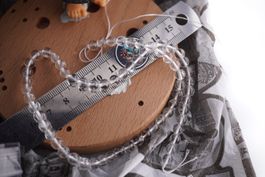 Bergkristall  Strang 6mm    –Edelsteinstube Rausverkauf