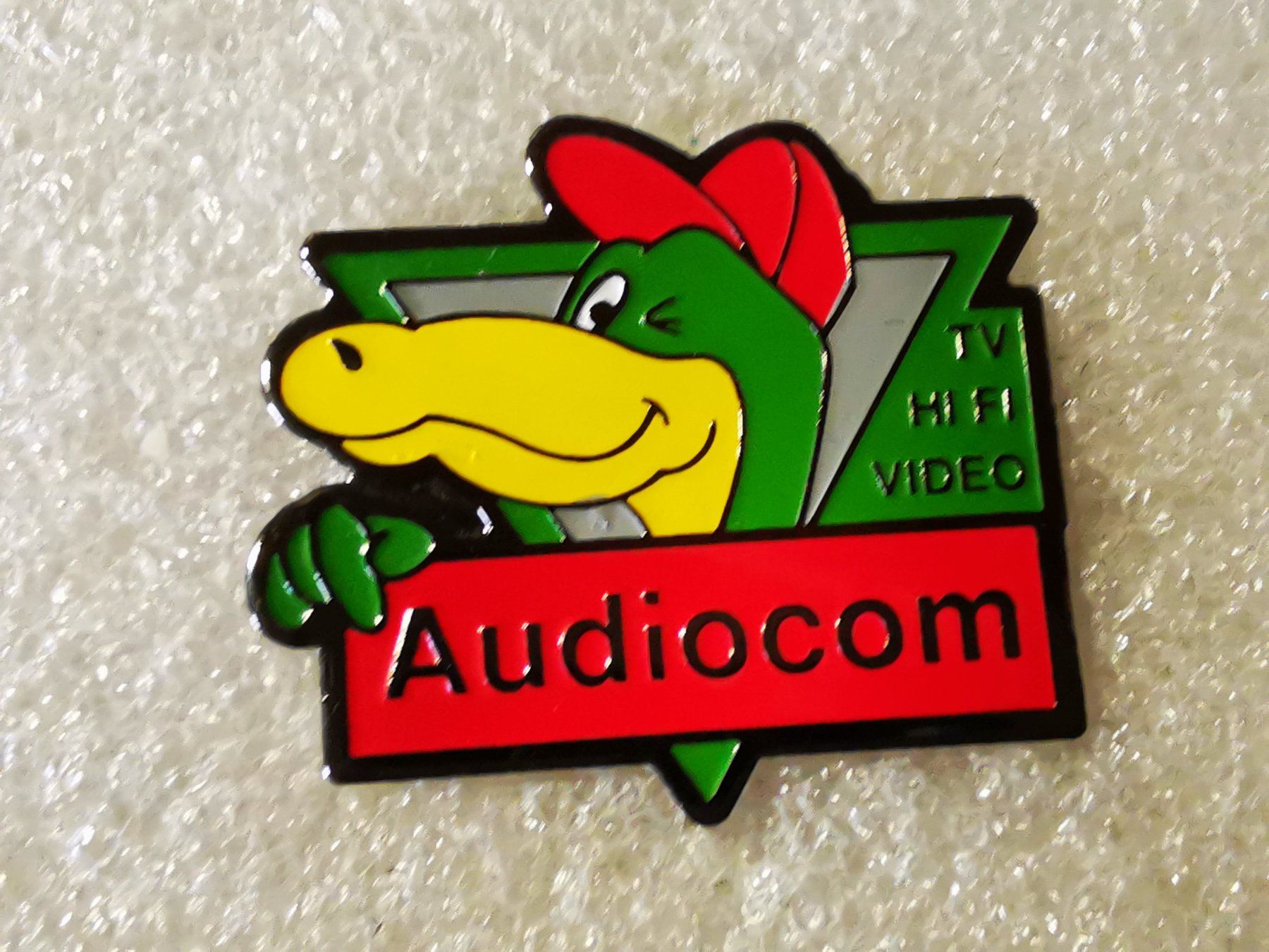 Placchette & Badge: Ansteckpin 157: Audiocom – Usato da Oppligen venduto da Pin-Fall-Shop