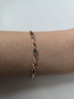 Goldarmband mit Topasen. 585er Gold. Neu.