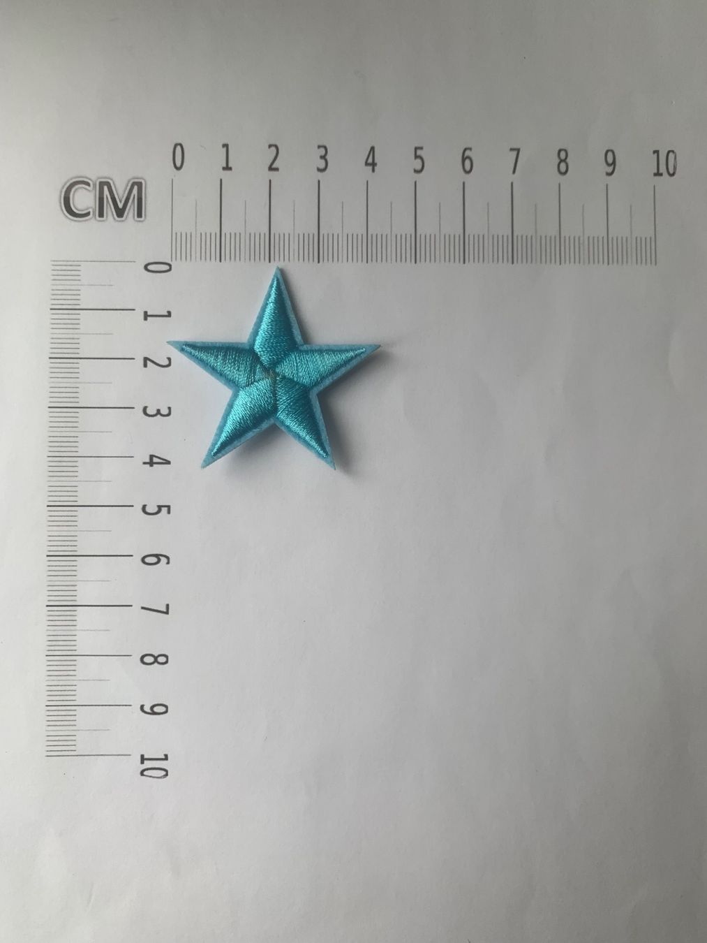 Toppe: Stern Hellblau Badge, Patch, Bügelbild – Nuovo e nell'imballaggio originale da Ostermundigen venduto da Mcone 1