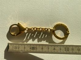 Schlüsselanhänger Swarovski,  goldig