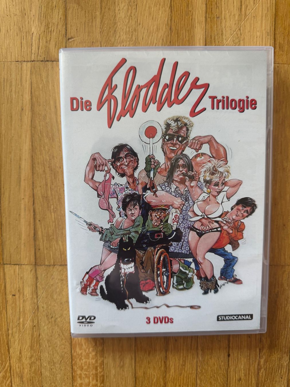Alle DVDs: DIE FLODDER TRILOGIE. (3DVDS) – Gebraucht aus Basel von san_2qlq