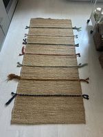 Tapis en jute tissé, 165 × 70 cm