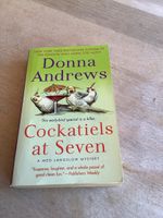 Buch Cockatiels at Seven Donna Andrews Roman gut erhalten