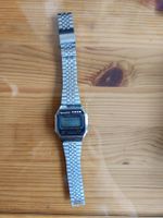 Montre rétro métal gris