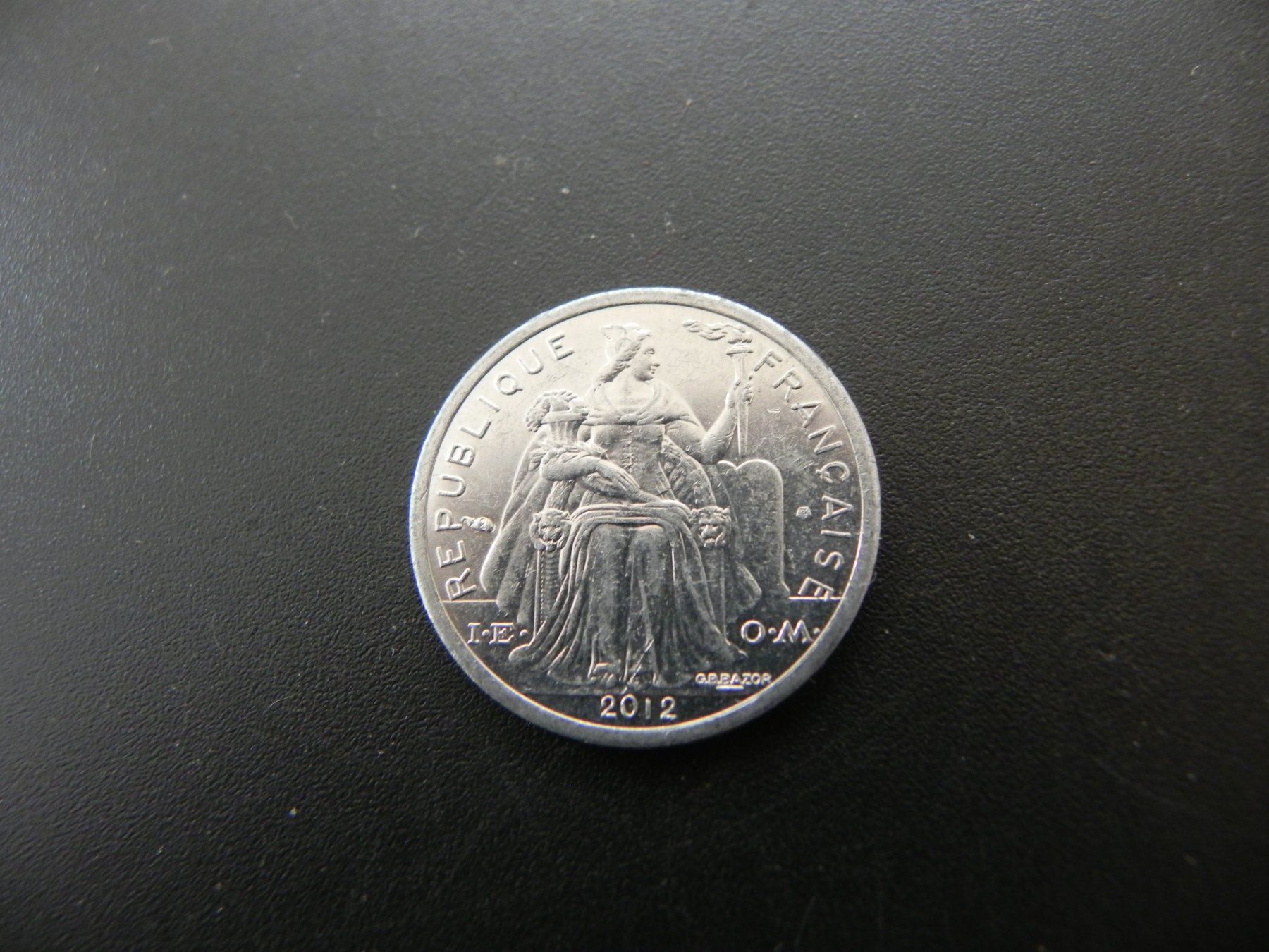 Toutes les monnaies: Neukaledonien 1 Franc 2012 – D'occasion à Biel/Bienne par Gogolozi