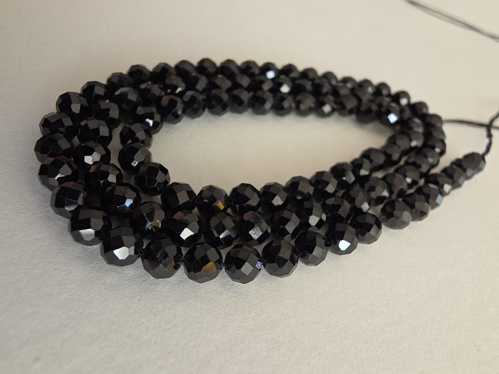 Minerali & Pietre curative: Spinell facettiert schwarz 4mm. Strang – Nuovo e nell'imballaggio originale da Menziken venduto da Mirager 1