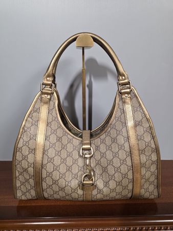 Gucci Handtasche GG Monogramm Leder Gold gebraucht 203491