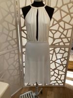Great white dress with appliqués. S