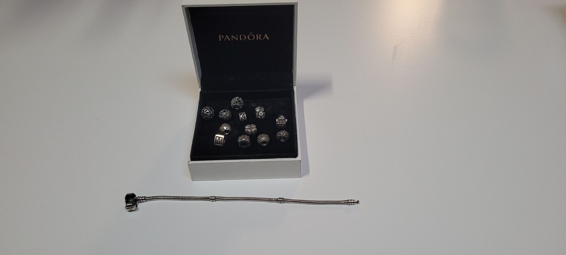 Pandora Bracciali & Braccialetti: Pandora Armkette Silber mit 12 Charms – Usato da Meinisberg venduto da mirreb 2