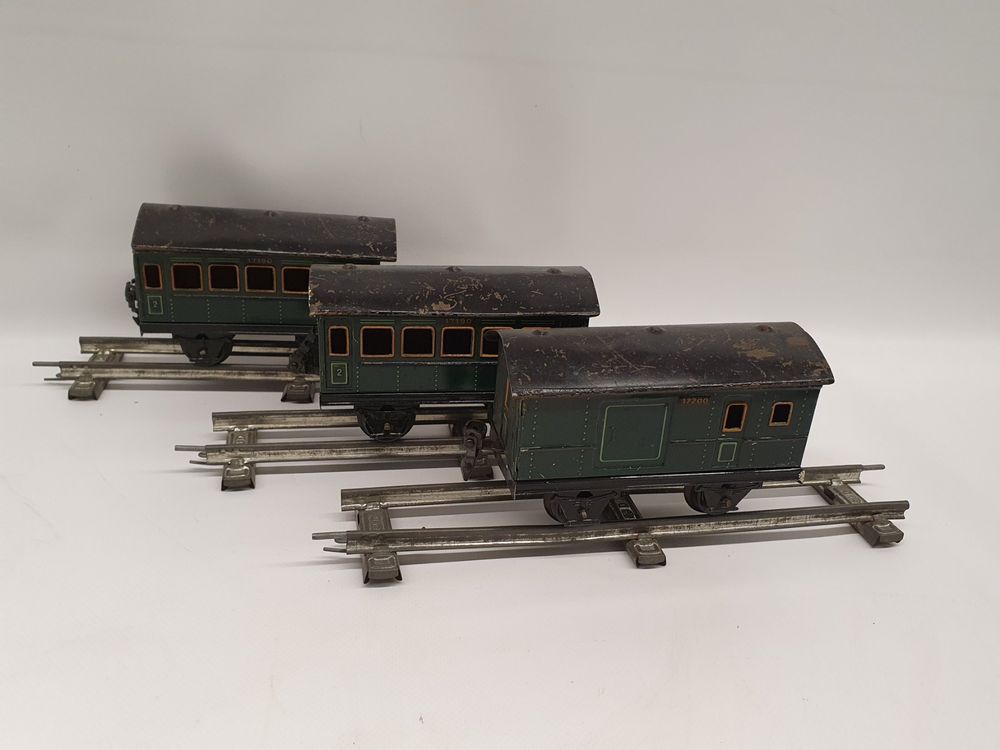 Märklin ancien 321 G . 3, wagon plat à ranchers à guérite chargé de