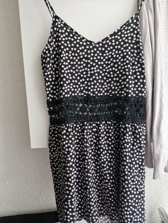 Jumpsuit kurz / schwarz mit weissen Blumen Gr. M
