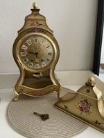 ancienne pendule Eluxa vintage dorée avec clé et décor flora