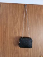 Sac bandoulière Lacoste cuir noir petit