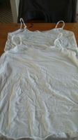 2 tops blancs(dames)