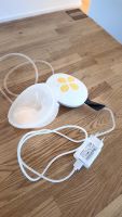 Medela Milchpumpe + 2 Behälter