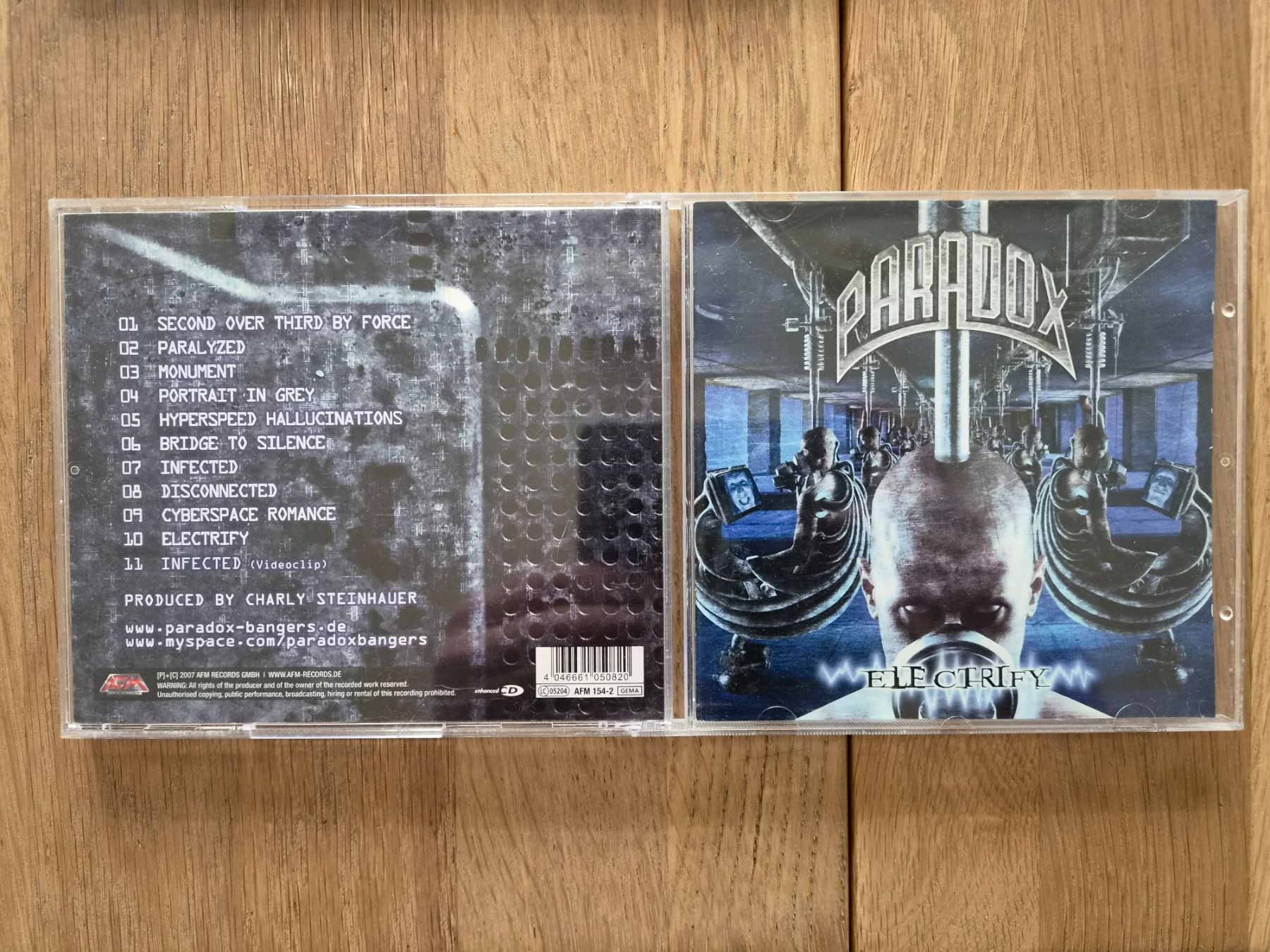 CDs: CD Paradox - Electrify, 2077 – Gebraucht aus Nebikon von Harley-Davidson01