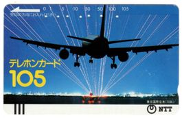 landendes Flugzeug auf früher Balken Telefonkarte von Japan