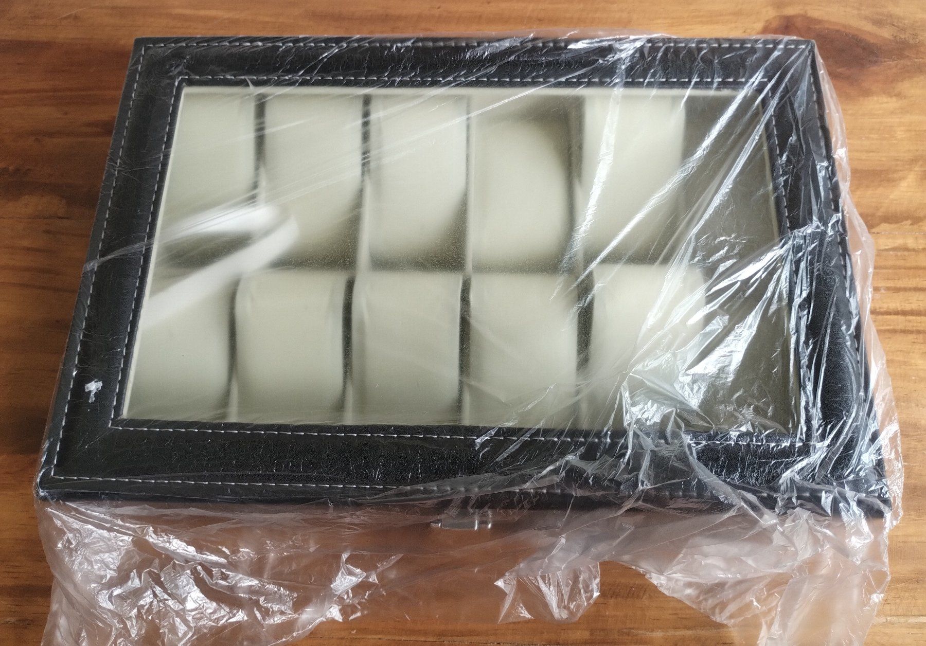 Uhrenboxen: Uhrenbox für 12 Uhren PU Leder – Neu und originalverpackt aus Lausanne von WATCH-WORLD 1