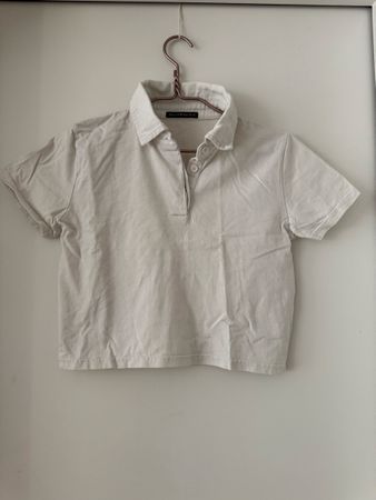 Polo court Brandy Melville beige taille unique bon état