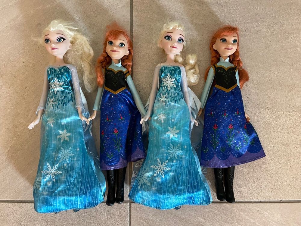 Anna deals elsa barbie