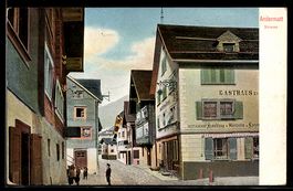 AK Andermatt, Strasse mit Gasthaus / Handlung und Kindergrup