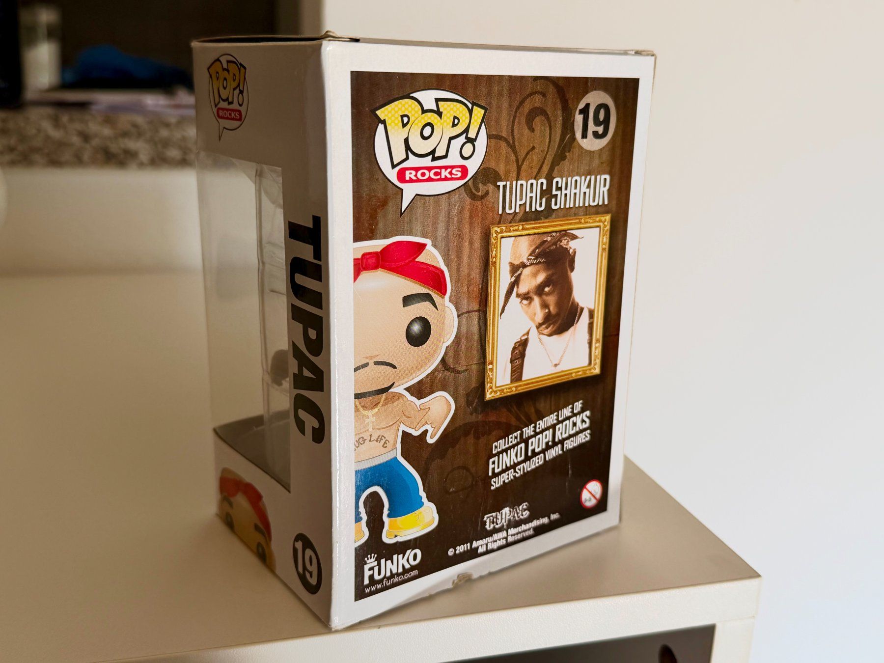 Funko Statuette: Funko Pop "Pop! Rocks" Nr. 19 TUPAC "no eyebrows" Version – Nuovo (secondo la descrizione) da Zürich venduto da NerdLoot 1