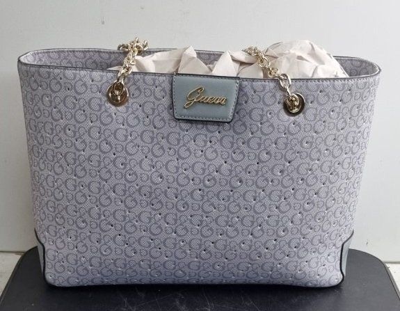 Guess Borse da donna: Gebrauchte Guess Handtasche mit Ketten – Usato da Flums venduto da Flumsantik