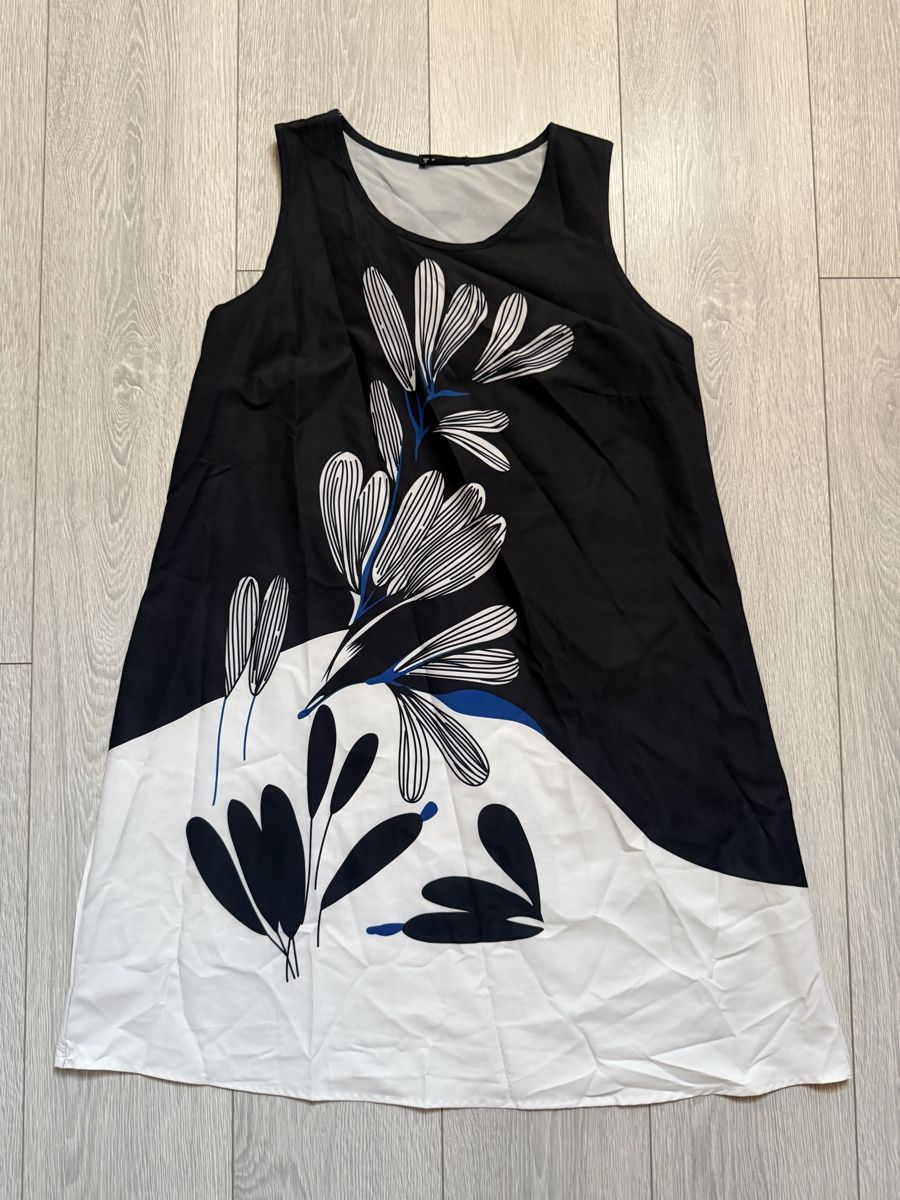 Robes: Robe sans manches à fleurs  – D'occasion à Crans VD par choukye