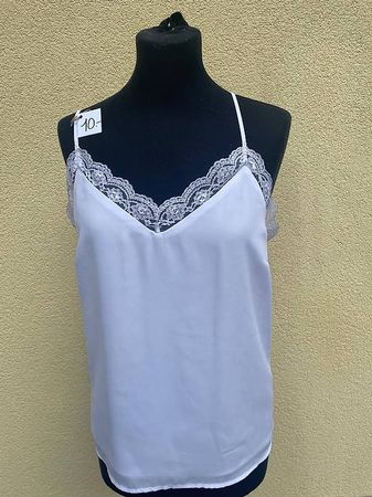 Vendo canotta con pizzo bianca e/o nera. 
