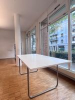 Stahlrohrtisch im Bauhaus - Stil mit weisser Tischplatte