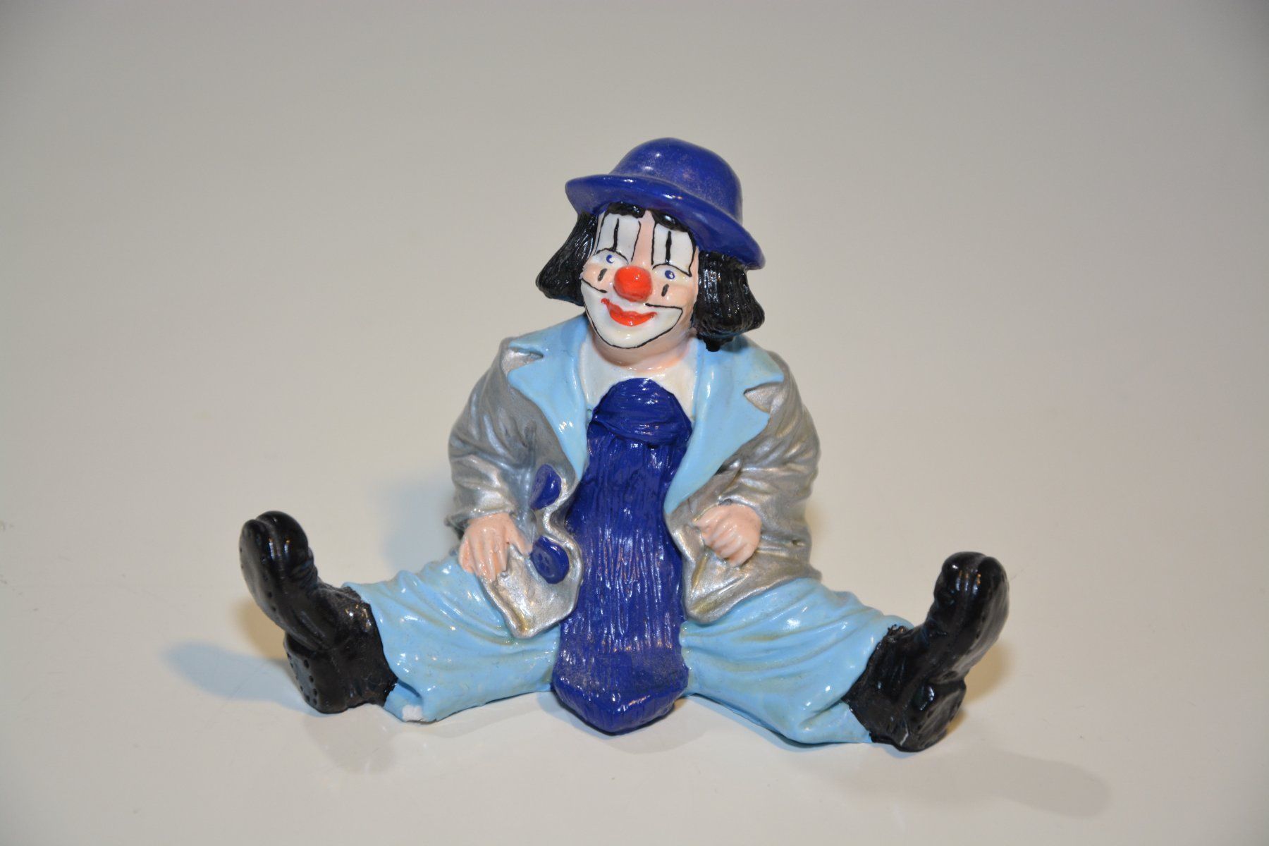 Statuette: LUSTIGE CLOWN SITZEND – Usato da Bassersdorf venduto da antikvintage