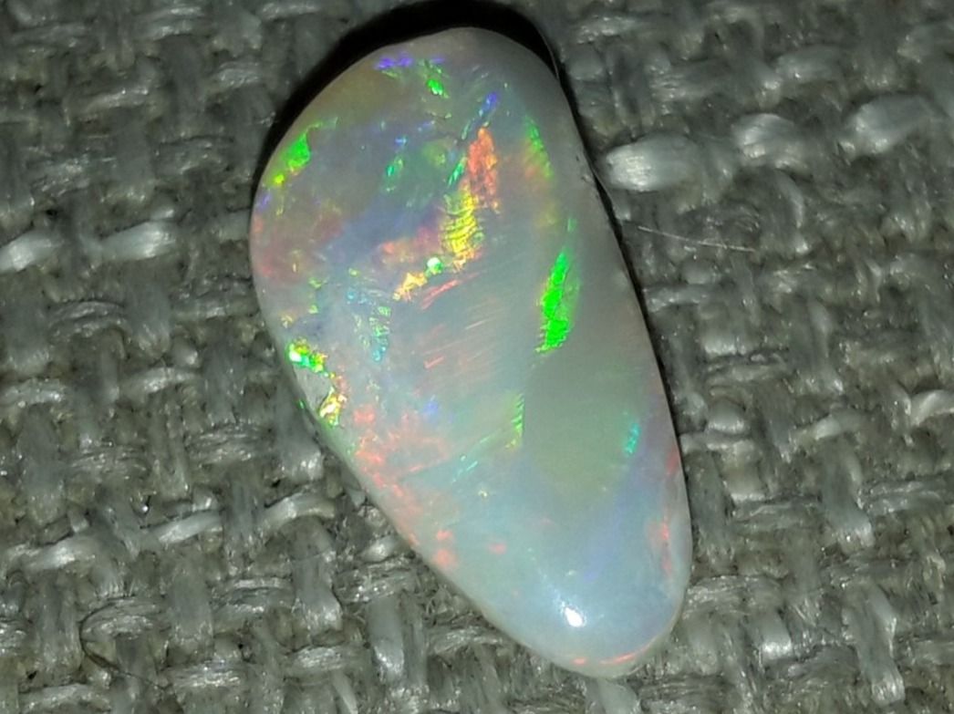 Pietre preziose: Australischer Multicolor Flashfire Opal 1.64ct – Nuovo e nell'imballaggio originale da Uerkheim venduto da Winwinner
