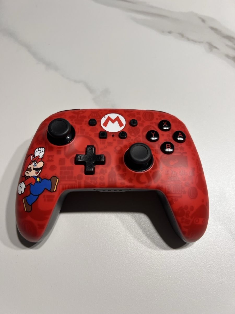 Nintendo Consoles: Nintendo Switch Pro Controller Super Mario Edition Top – Neuf (Voir description) à Winterthur par ChicMarkt