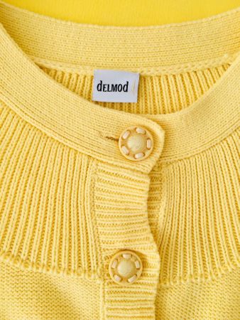 Vanillefarbene Strickjacke aus Baumwolle