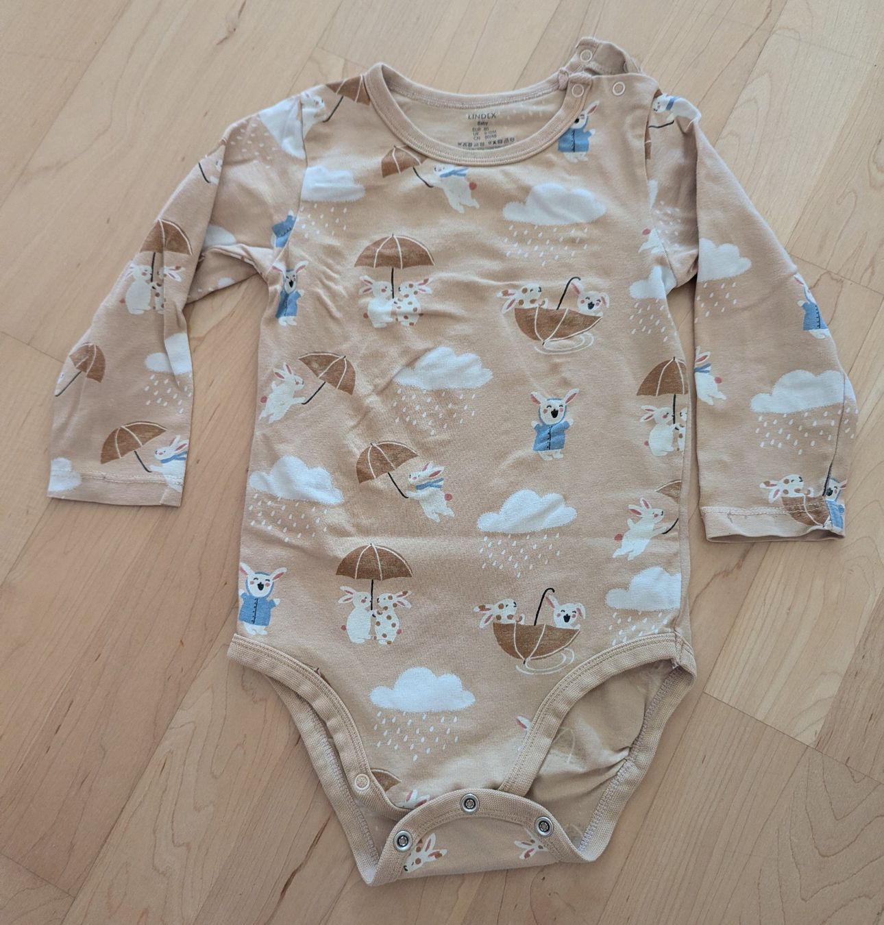 Biancheria intima: Body langarm beige Grösse 80 mit Hasenmuster – Usato da Uster venduto da petches