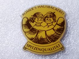 Ansteckpin 33: Romers Hausbäckerei