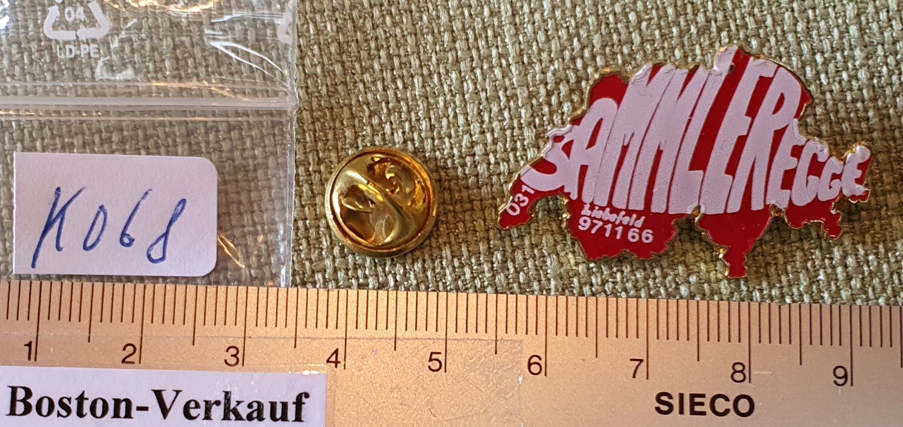 Raccolte di bollini & punti: K068 - Pin Schweiz Sammeregge Lisbefeld – Usato da Reinach BL venduto da Boston-Verkauf 1