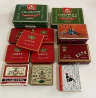 13 alte Cigarettendosen aus Blech & Pappe